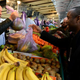 A man buys fruit at the Marche Barbes, the outdoor market located in the 18th arrondissement, in Paris on Nov. 18, 2015, as normal life resumes in the area.
Frederic T. Stevens/Getty Images